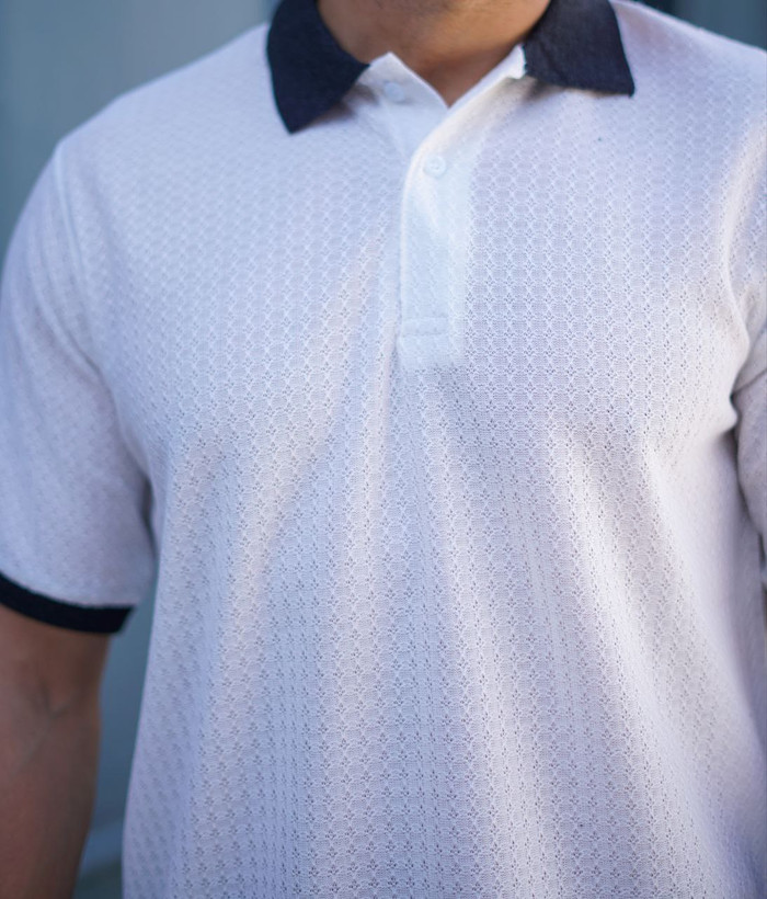 پولوشرت سفید یقه دو دکمه بافت ظریف اکریل، مناسب برای خرید عمده لباس مردانه