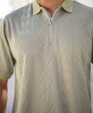 پخش و خرید عمده پولوشرت مردانه یقه نیمزیپ ,بافت ظریف طرح اسکاج